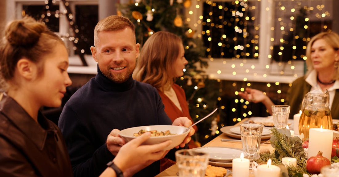 A joyful family gathering during Christmas with festive decorations and a delicious meal.